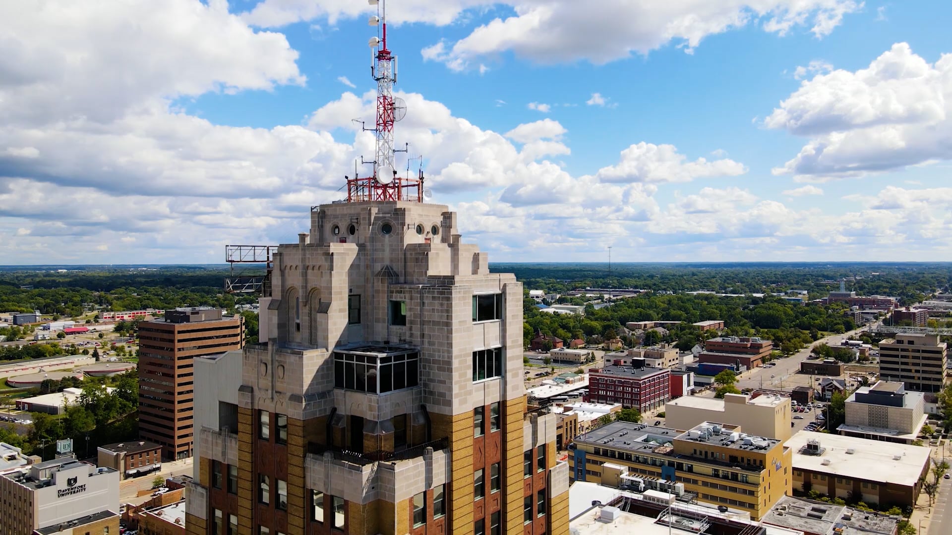 A photo of the top of Boji Tower and surrounding buildings. 